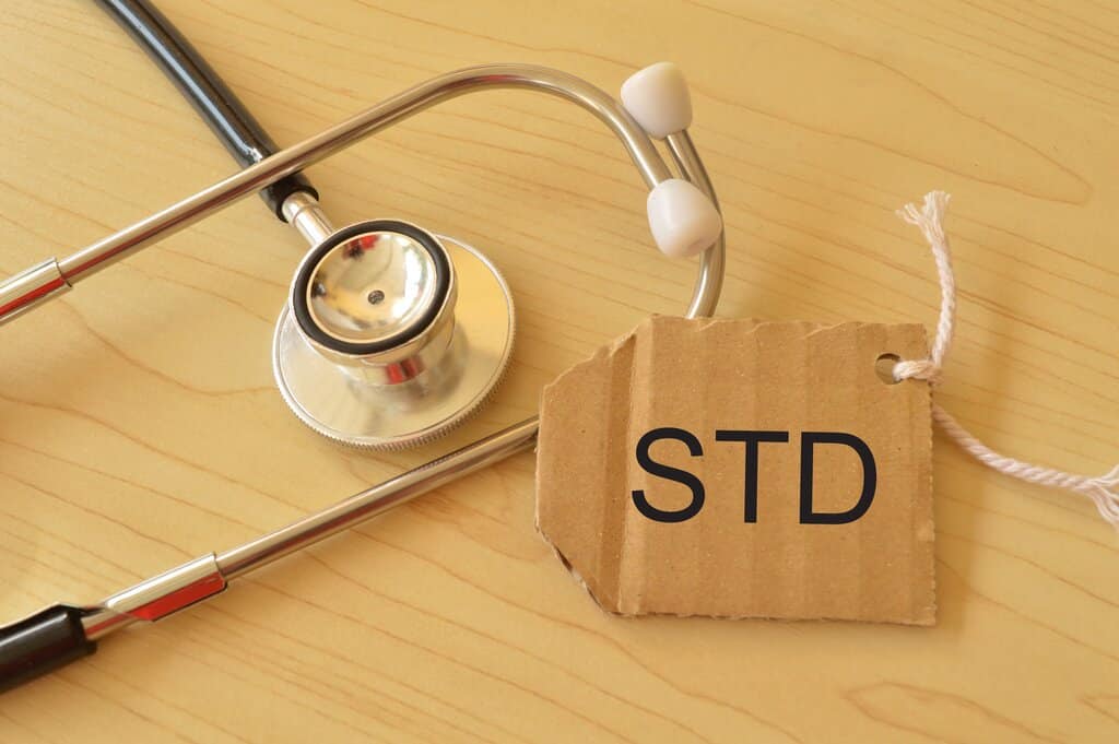 Stethoscope and label tag written with STD